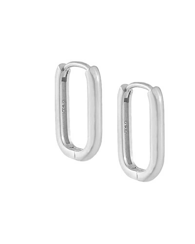 Front of a size 10 MM Solid Oval Huggie Earring Silver 10 MM in Silver by By Adina Eden. | dia_product_style_image_id:292450